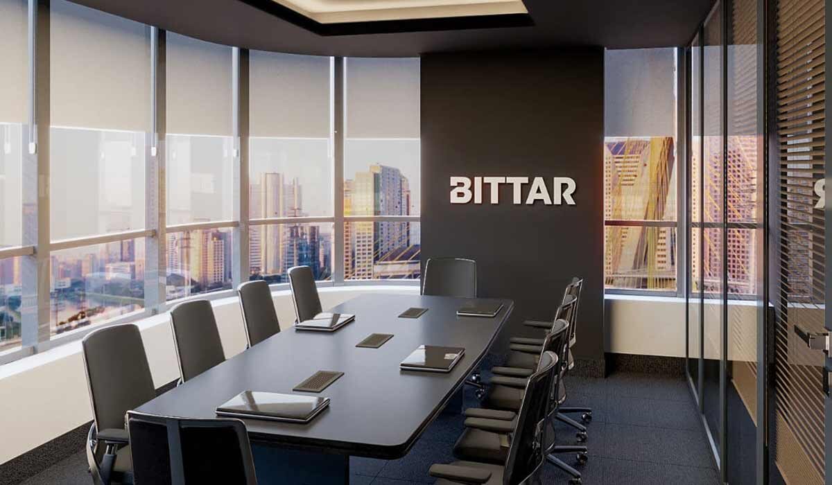 Sala de Reuniões com uma mesa de 10 cadeiras do Escritório Bittar